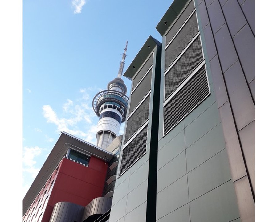 Weather louvres integrated into a commercial building façade