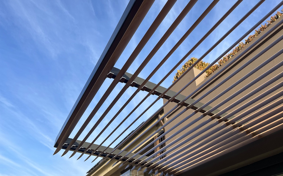 Timber-look aluminium louvre blades in a Sapele finish at a Mosman residence